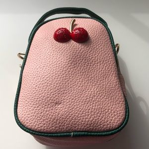 Pink top handle crossbody purse
